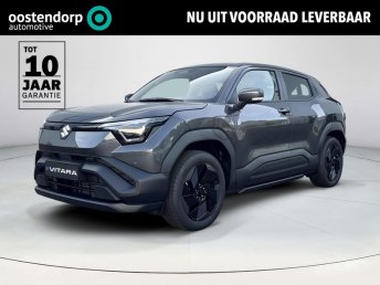 Suzuki e VITARA Select 61 kWh |100% ELEKTRISCH | Climate Control | Navigatiesysteem | Apple CarPlay & Android Auto | Parkeersensoren voor- en achter | Adaptieve Cruise Control | Stoelverwarming voor | Stuurverwarming | Fabrieksgarantie nieuw 2026